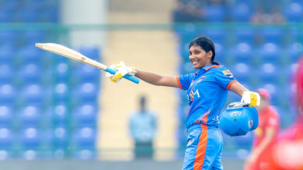 Photo: Delhi Premier League : North Delhi Strikers' Upasana Yadav after hitting a ton in DPL T20 Women's final.